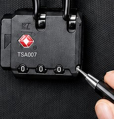 Pressing the lock reset button with a pen tip